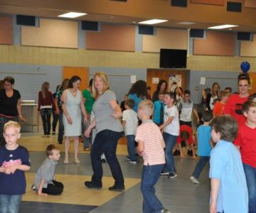 Can My Husband Attend a Mother-Son Dance School Program?